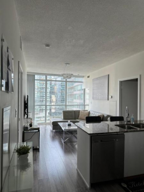 Newly updated 2BR, 2Bath & Den in Downtown Toronto beside Union Station & Scotia Bank Arena!